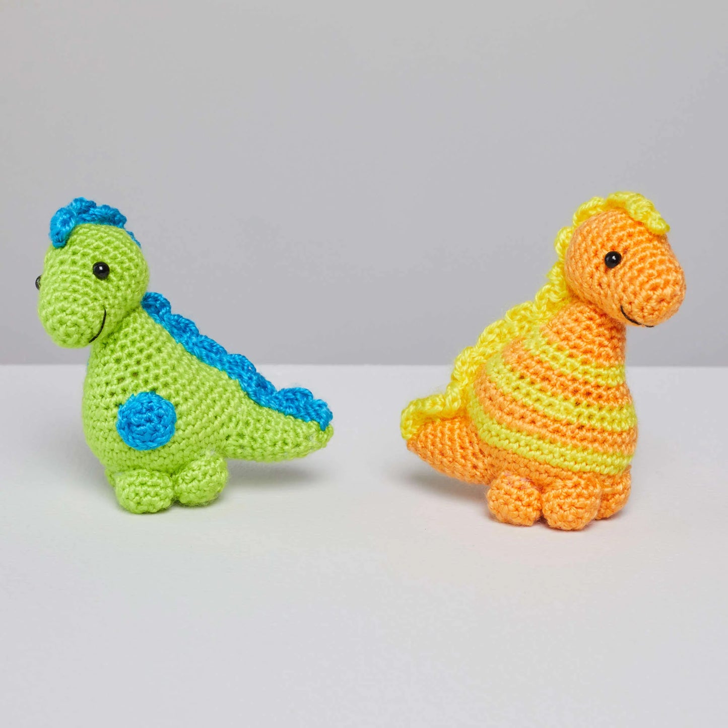 Red Heart Amigurumi Yarn Dinosaurs 3.5oz Acrylic - Makes 2 Items!